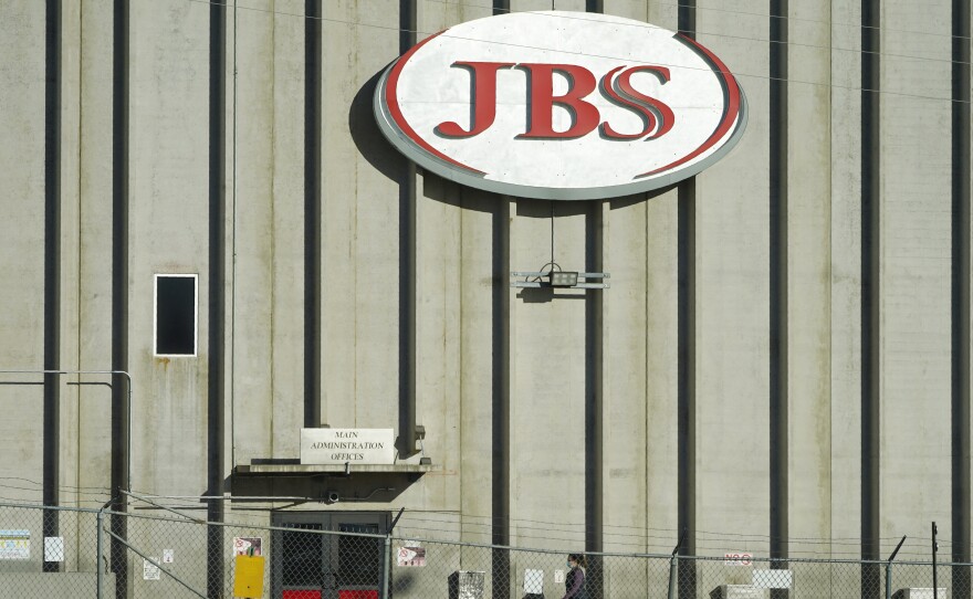 The meatpacking company JBS confirms it paid an $11 million ransom to hackers who targeted its U.S. and Australia operations.