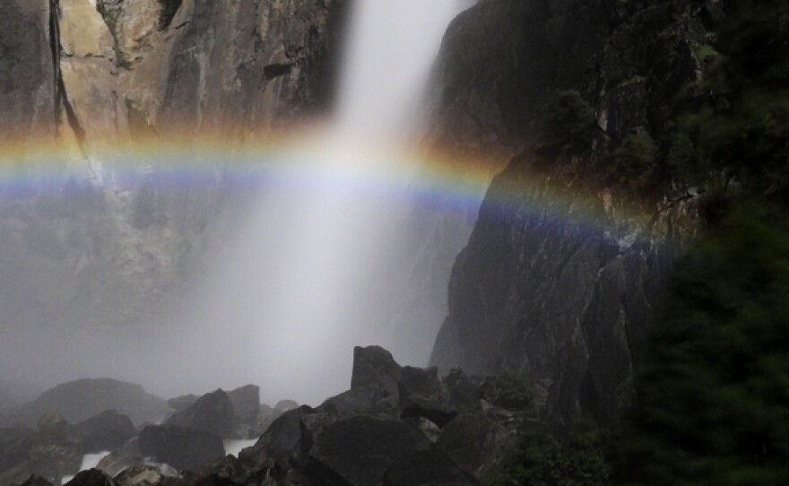 The moonbow at Yosemite Falls is only visible when the moon hits the mist at the base in the right way. Some photographers time their visits to the park to capture the rainbow's colors with a long exposure.