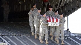 A U.S. Army carry team transfers the remains of Staff Sgt. Randall R. Lane during a dignified transfer Sept. 15, 2013 at Dover Air Force Base. 