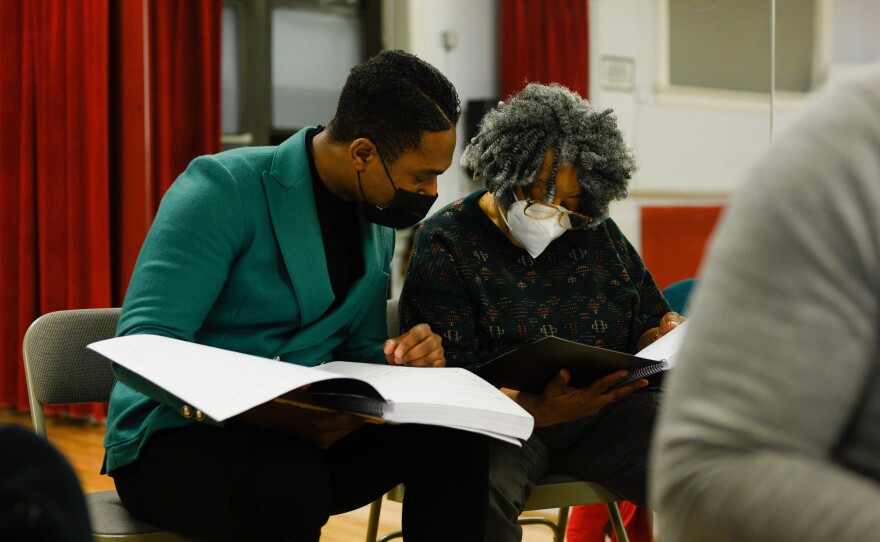 Chorus director Malcolm J. Merriweather, left, and composer Mary D. Watkins, right, review the chorus music for<em> Emmett Till, A New American Opera</em> at Ripley-Grier Rehearsals in New York, NY on March 17, 2022.