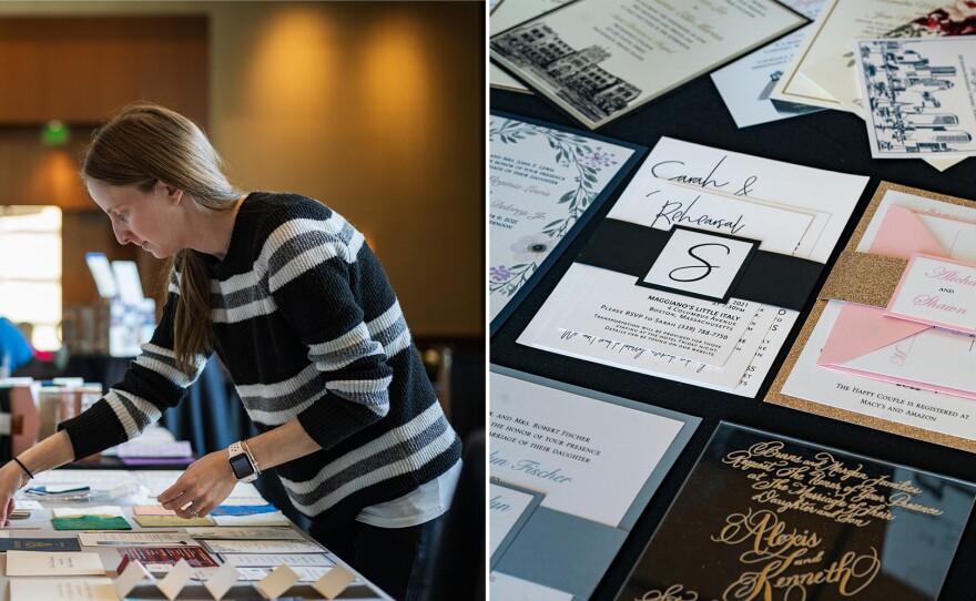 Julie Kaplan, the designer for Emerald Invitations, sets up her booth during the Great Bridal Expo. She says it's a big relief to have the wedding business picking up again.
