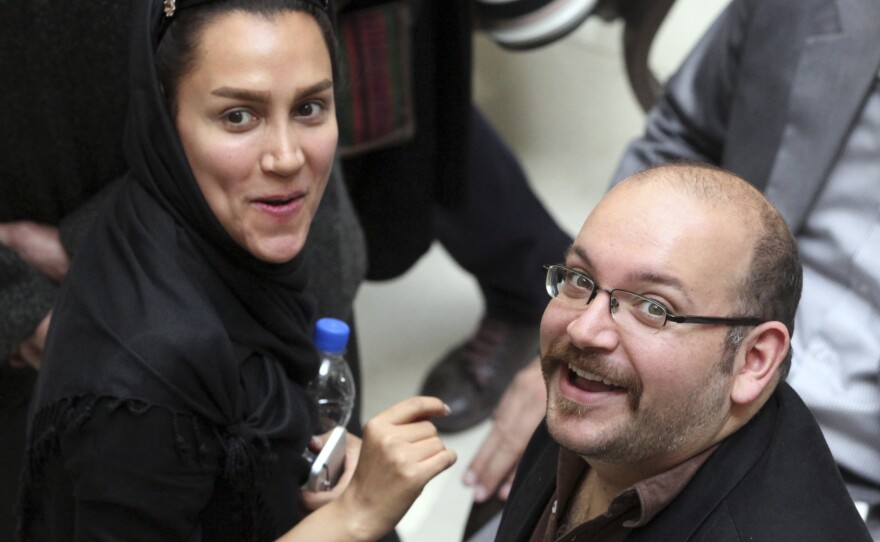 A 2013 photo shows Washington Post reporter Jason Rezaian and his wife, Yeganeh Salehi, a correspondent for the Abu Dhabi-based newspaper The National. Both of them were in an Iranian court Tuesday.