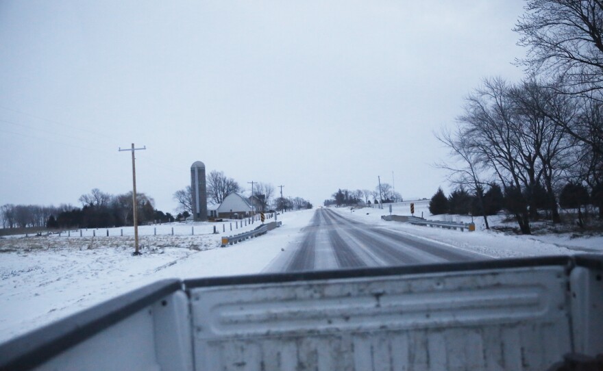 Farms near Independence, Iowa fill the view out the back of Ryan Kress's truck.