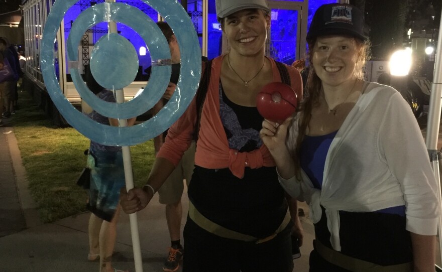 Sisters Gretchen and Samantha Cash and their home-made PokéStop.