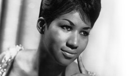 A black and white publicity photo of Aretha Franklin, the Queen of Soul.
