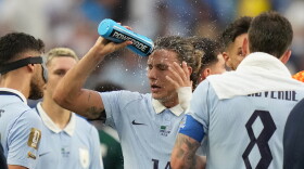 Uruguay's Agustin Canobbio cools off during a hydration break in a World Cup soccer match against Saudi Arabia in Miami Gardens, Fla., on June 15, 2026. Dangerously hot, humid weather in the area prompted an extreme heat warning from the National Weather Service earlier in the day.