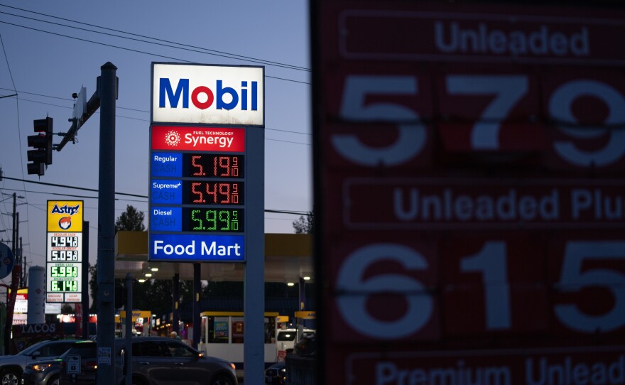 Gasoline prices are displayed at a Mobil gas station on April 29 in Portland, Ore.