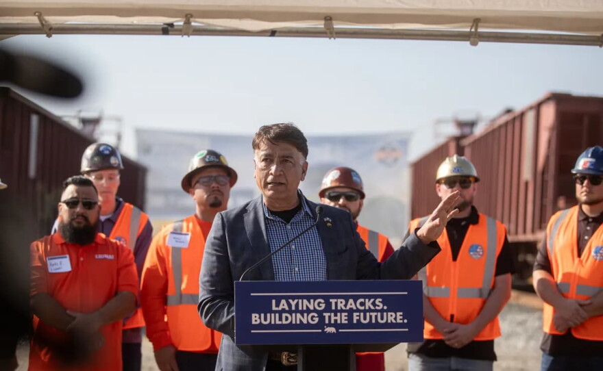 Ian Choudri, CEO of California High Speed Rail, speaks during a press conference on the high-speed rail project at the Wasco Rail Yard facility in Wasco on Feb. 3, 2026.