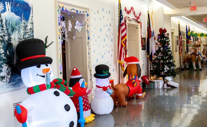 Holiday decorations are set up outside several offices. A friendly competition is sparked each year between members of Congress.