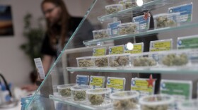 Various kinds of marijuana strains are displayed at the KindPeoples dispensary in Santa Cruz on Dec. 29, 2017.