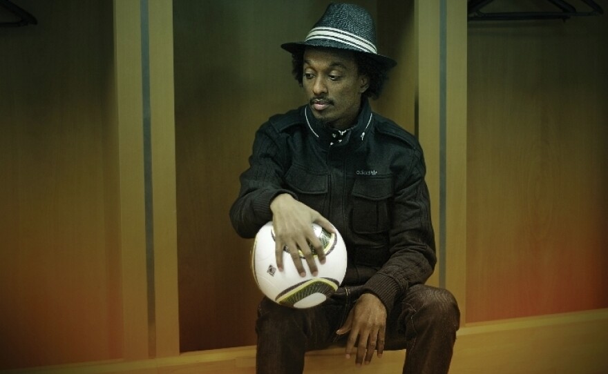 K'Naan's new album is titled <em>Country, God or the Girl</em>.