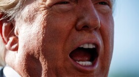 President Donald Trump talks with reporters before departing on Marine One for the Air Force Academy graduation ceremony, Thursday, May 30, 2019, in Washington.