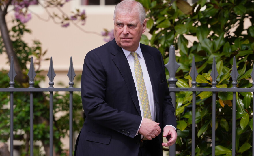 FILE - Britain's Andrew Mountbatten-Windsor, formerly known as Prince Andrew, looks round as he leaves after attending the Easter Matins Service at St. George's Chapel, Windsor Castle, England, April 20, 2025.