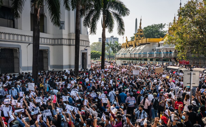 Protests continued on Monday in cities across Myanmar, including this one in Yangon, as people took to the streets to demand the release of de facto leader Aung San Suu Kyi and return to democratic rule following a military coup.