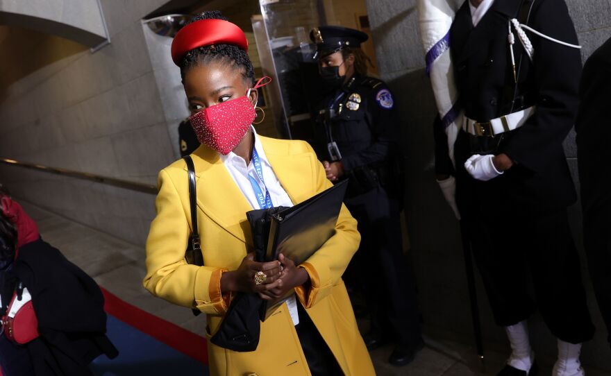 Former National Youth Poet Laureate Amanda Gorman arrives at the inauguration of US President-elect Joe Biden on the West Front of the US Capitol on Jan. 20 in Washington, DC. Gorman says she was tailed Friday night by a security guard who said she looked "suspicious."