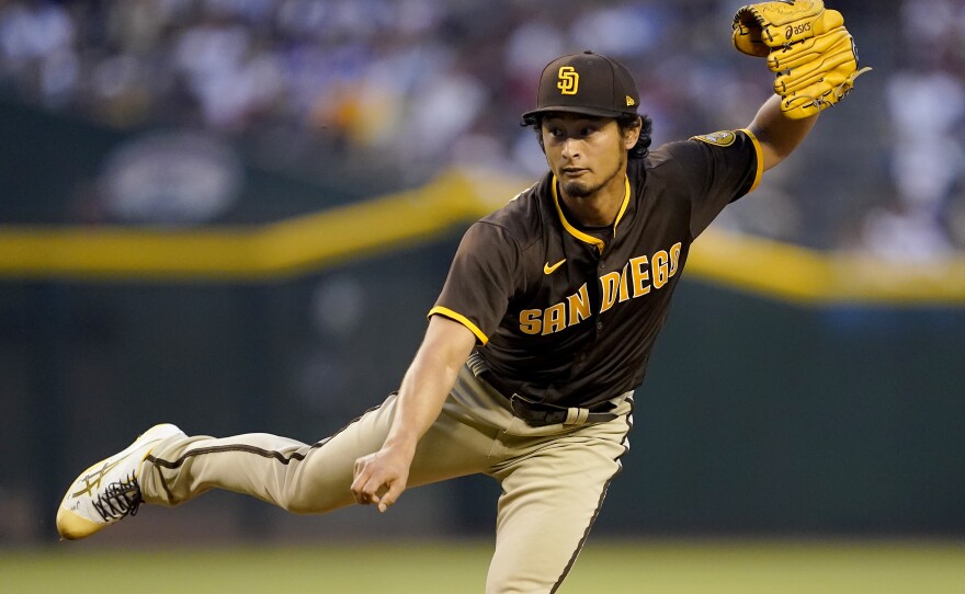 San Diego Padres pitcher Yu Darvish throws against the Arizona Diamondbacks during the first inning of a baseball game, Thursday, April 7, 2022, in Phoenix.