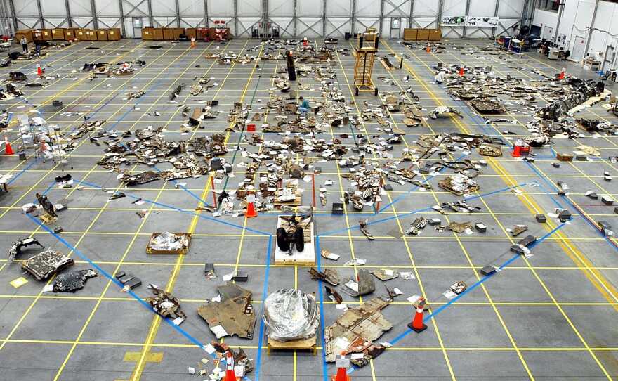 Columbia Space Shuttle debris covers the floor of the RLV Hangar Kennedy Space Center, Florida in May 2003.