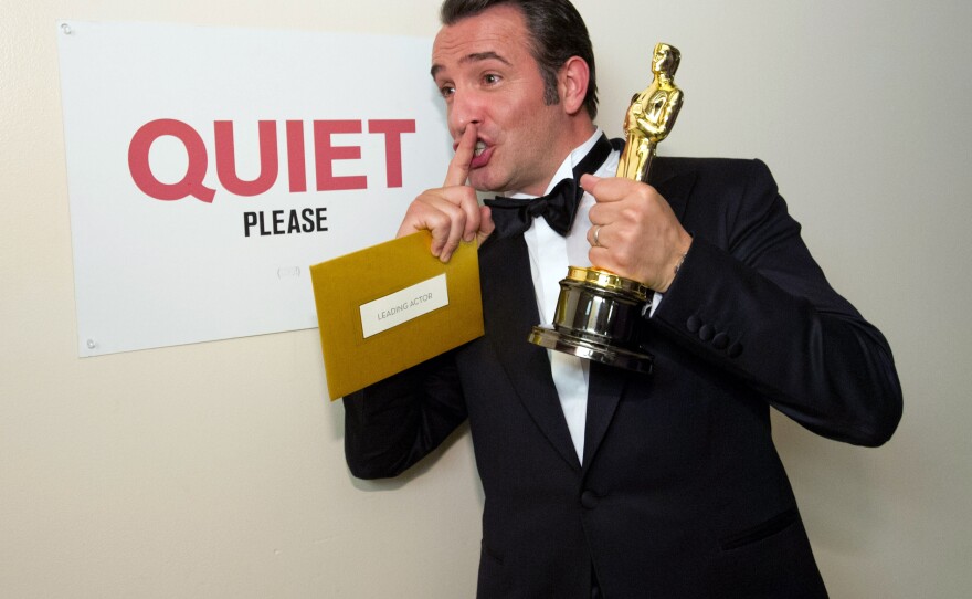 Best Actor Winner Jean Dujardin having fun backstage after his win.