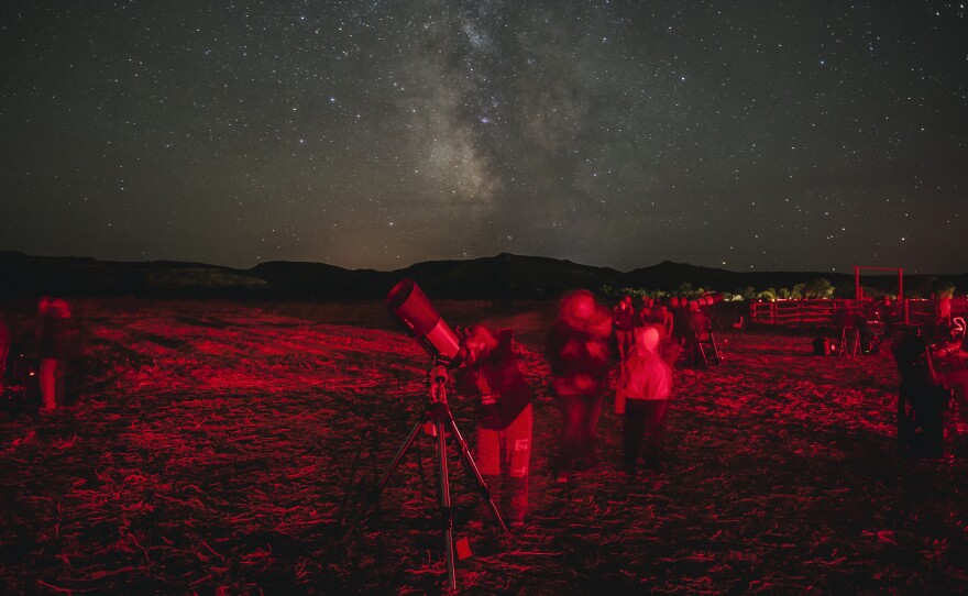 Star gazers flock to the south unit of Theodore Roosevelt National Park in western North Dakota for the annual Dakota Nights Astronomy Festival. Red lights were used during the event to help people move between telescopes without ruining their night vision. Between 2010 and 2013, the amount of non-natural light visible from the park increased by 500 percent, more than in any other national park.