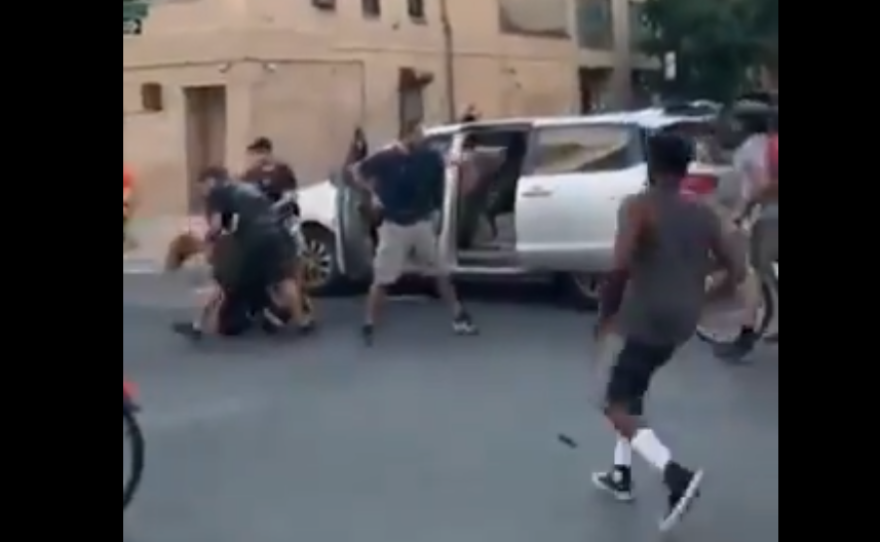 A video posted to social media shows police detain a woman during a New York City protest and shove her into an unmarked van.