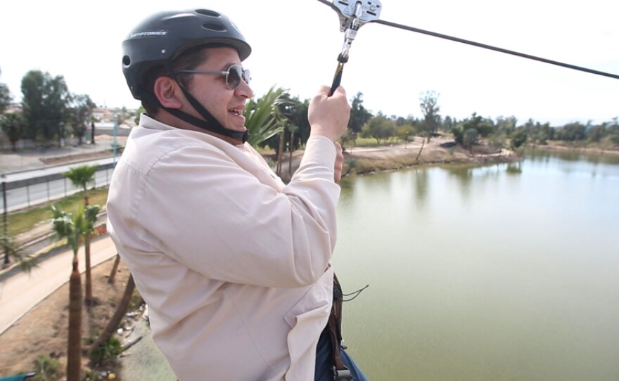 CROSSING SOUTH host Jorge Meraz tries a zip-line at a park in Mexicali City, Baja California, Mexico.