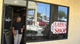 Terry Spears leaves his barbershop, Custom Cuts, in National City, April 26, 2017.