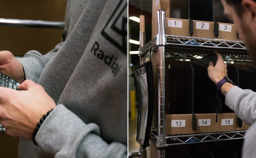 Beatty's scanner indicates where to find each item and then where to place it in his cart. Each slot in the cart corresponds to a single online shopping order.