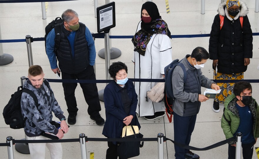 People stand in a security line at John F. Kennedy International Airport in New York City on April 19.