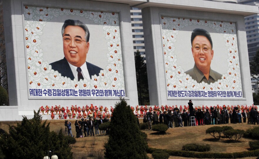 Mosaics of the two late North Korean leaders — Kim Jong Il (right) and Kim Il Sung, the country's founder — are unveiled Monday during celebrations marking the 100th anniversary of Kim Il Sung's birth, in Pyongyang, North Korea.