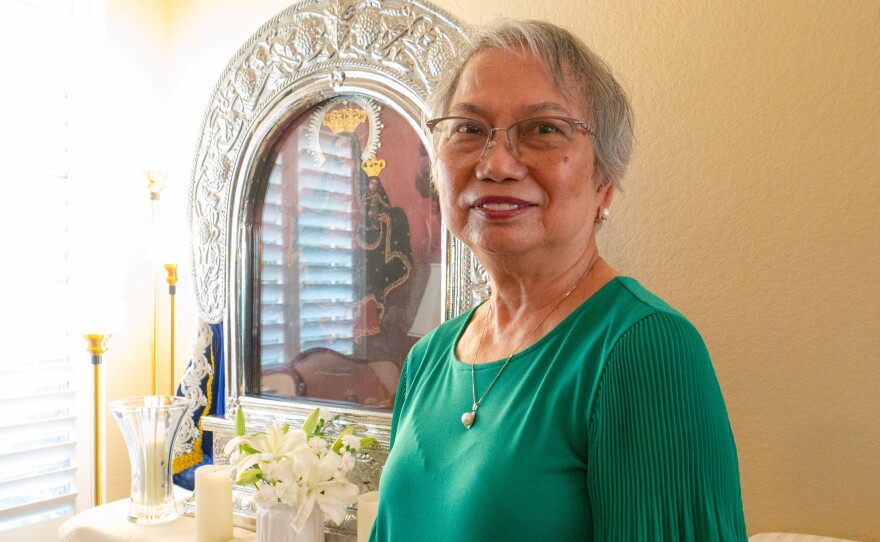 Freci Portugal stands for a portrait in her home on June 1, 2026.