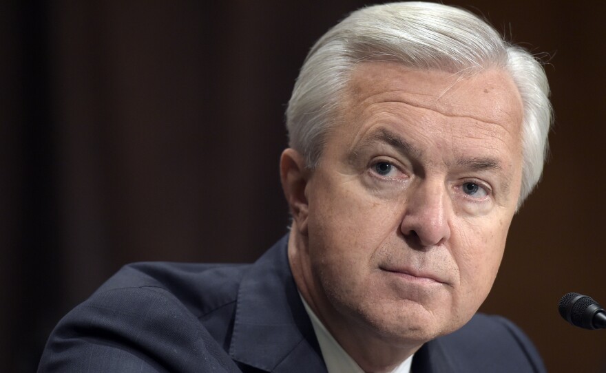 Wells Fargo CEO John Stumpf testifies before the Senate Banking Committee in September. Stumpf is resigning effective immediately in the aftermath of the bank's sales tactics scandal.