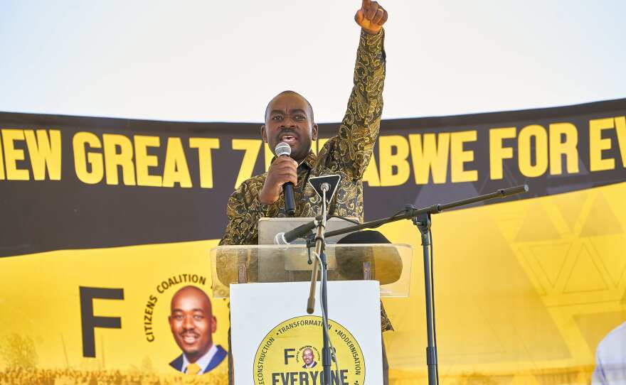 Opposition presidential candidate Nelson Chamisa, leader of the Citizens Coalition for Change (CCC), signals to the crowd with his finger, the party symbol, during a rally at White City Stadium in the city of Bulawayo, Zimbabwe, ahead of general elections on Wednesday.