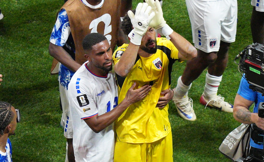 Cape Verde goalkeeper Vozinha (1) and Deroy Duarte (14) celebrate a tie during the World Cup Group H soccer match between Spain and Cape Verde in Atlanta, Monday, June 15, 2026.