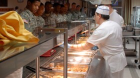 Soldiers line up for breakfast.