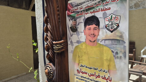 A poster announces the death of Nayef Samaro, 25, after he was killed during an Israeli military raid on Nablus in May.