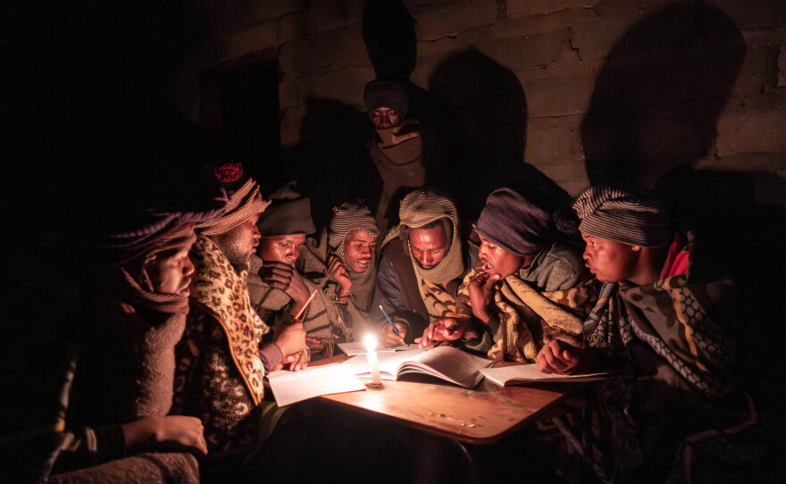 Shepherds attend a part-time night school near Mokhotlong, Lesotho. For many, these classes are the only form of education they can access.