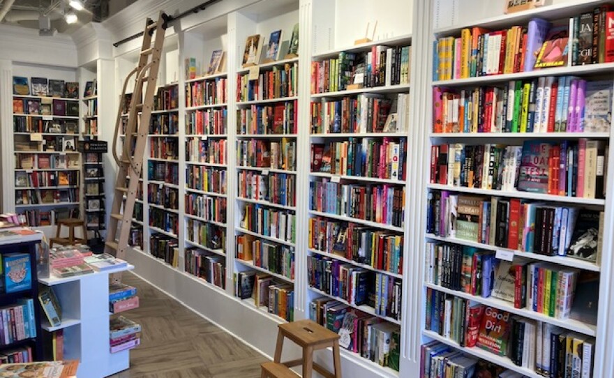 Camino Books in Del Mar is shown in an undated photo. Bookshelves line a wall, with a sliding ladder propped against the wall.