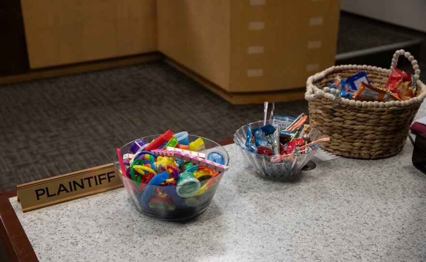 Fidget toys and snacks are provided for young adults attending court proceedings for DAAY court.