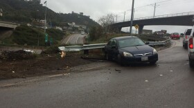 Two cars collide on Interstate 8 in San Diego, Dec. 22, 2015. 