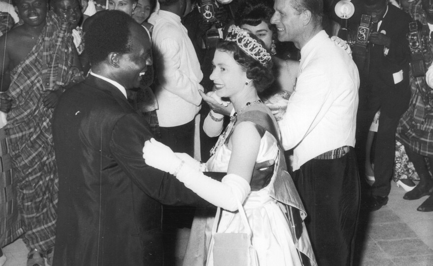 Queen Elizabeth II dances with Ghanaian President Kwame Nkrumah at a ball in Accra, Ghana, in 1961.