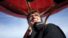 Stephen Fry flies over North Carolina in a hot-air balloon. 