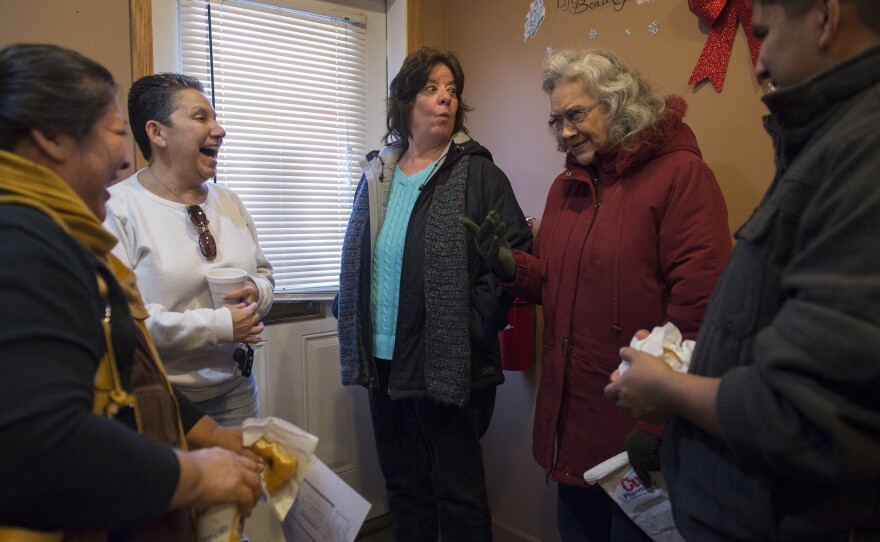 Residents gather in the Park Plaza office. Many say that as the cooperative matures, it's building a sense of community.