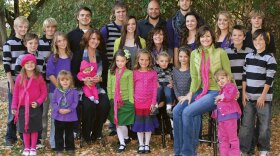 <p>Joe, Alina, Vicki and Valerie Darger are raising 23 children together. (Two children, Sam and Victoria, are not shown.)</p>