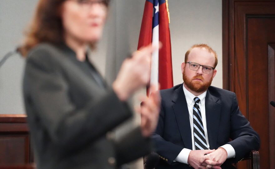 Defendant Travis McMichael testifies under cross-examination by prosecutor Linda Dunikoski at the Glynn County Courthouse last week in Brunswick, Georgia.