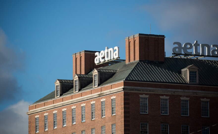 Aetna was the first insurer to announce its plan to help shield patients with COVID-19 from high medical bills. But out-of-network charges and other surprise bills remain a risk, say advocates for patients.