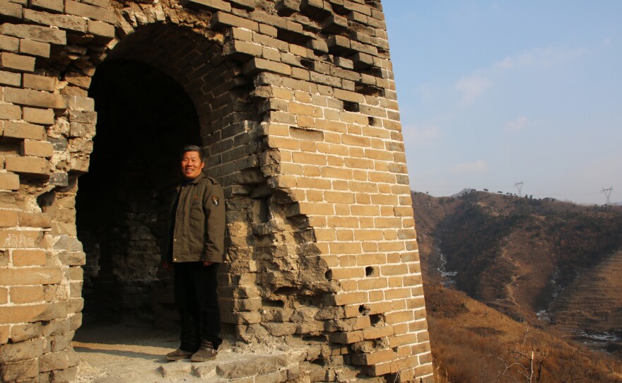 Qiao Guohua, a resident of Jielingkou village, is paid a small sum of money by the local government to patrol a section of the Great Wall. He's come to know every feature of the wall and its surrounding landscape intimately.