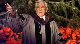 Rev. Robert H. Schuller delivers one of seven candlelight Christmas Eve services from the Crystal Cathedral pulpit in Garden Grove, Dec. 24, 1997.