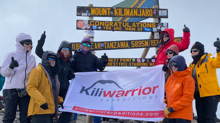 Kiliqueens on the summit of Mount Kilimanjaro, Tanzania, February 2023.