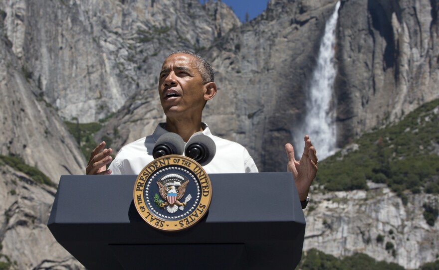President Barack Obama speaks by the Sentinel Bridge in the Yosemite Valley, in front of Yosemite Falls which is the highest waterfall in the park at Yosemite National Park, Calif., on June 18, 2016. The Obama family traveled to Yosemite to celebrate the 100th anniversary of the creation of America's national park system. 