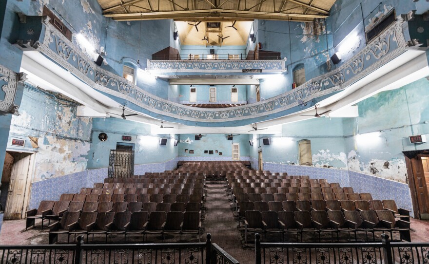 A view of the Edward Theatre in Mumbai from the vantage point of its stage and screen. Between 2010 and 2019, the number of single-screen cinemas across India dwindled from about 10,000 to less than 7,000. Dozens more have announced they're shutting down this year after a deadly second wave of infections.